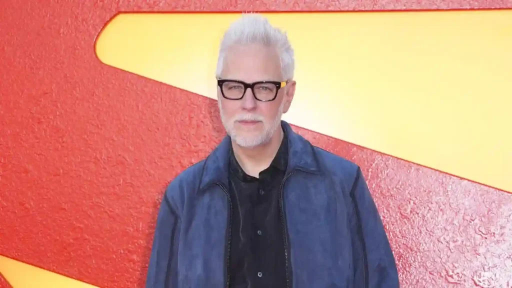 james gunn posing while at the premiere for superman